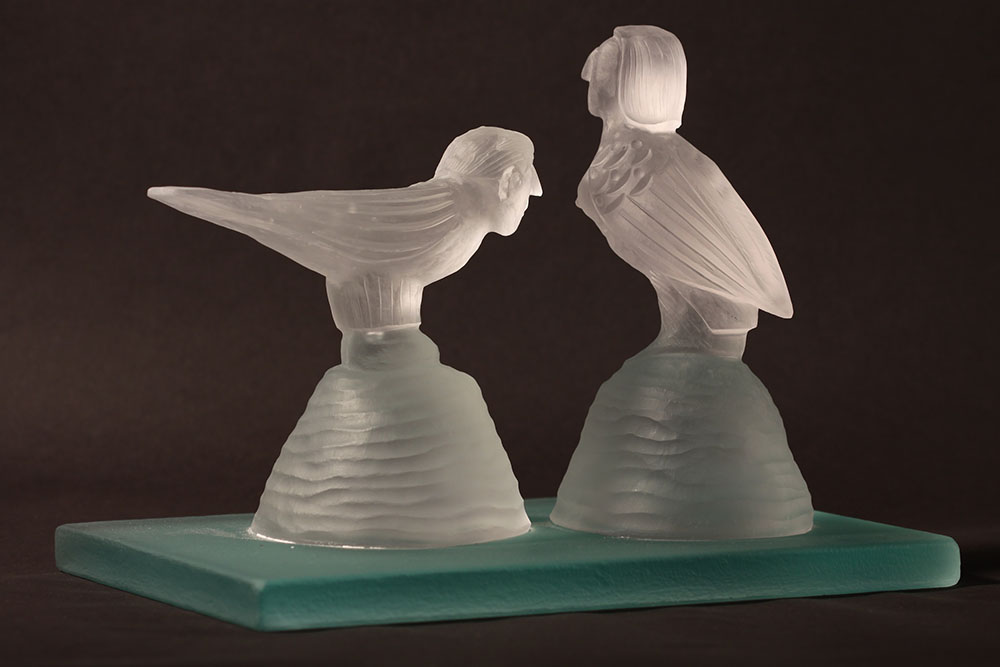 Bird man and Harpy ( two of a kind) Kiln cast crystal glass modelled carved and diamond wheel.JPG